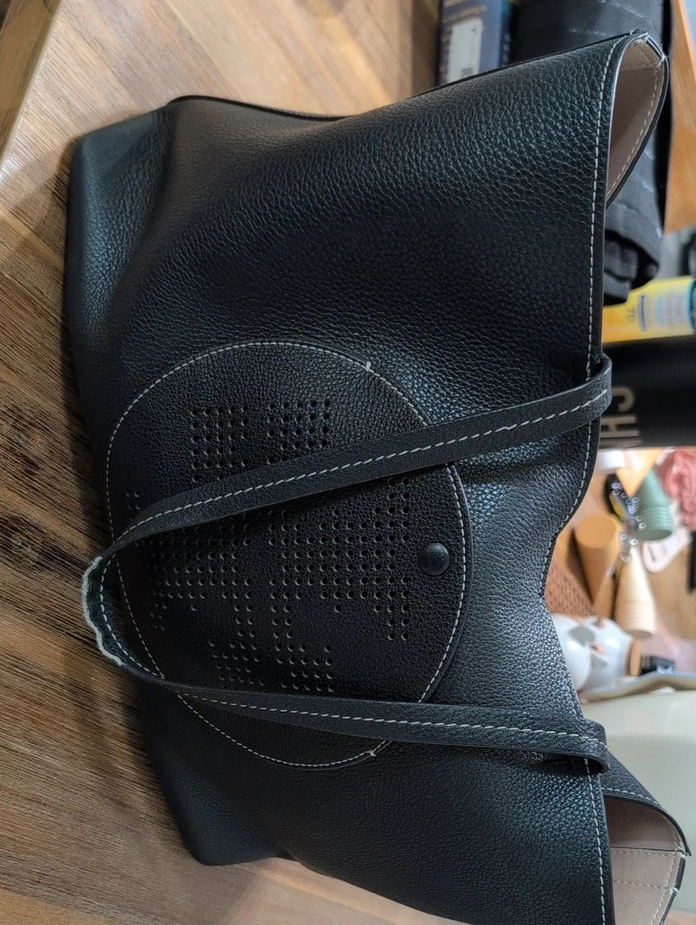 Black Leather Tote Bag with Perforated Detail.